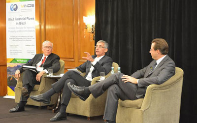 Raymond Baker, Leonardo Burlamaqui, and Matt Woods (Left to Right) on a panel at GFI's conference in Rio de Janeiro on September 9, 2014.
